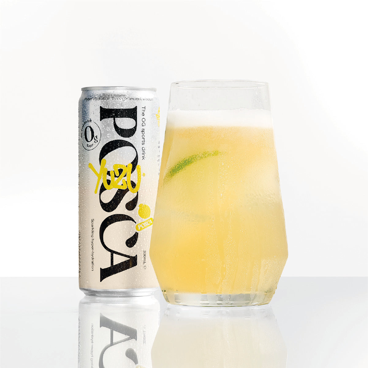 Yuzu - Can of POSCA with a glass of yellow beverage.
